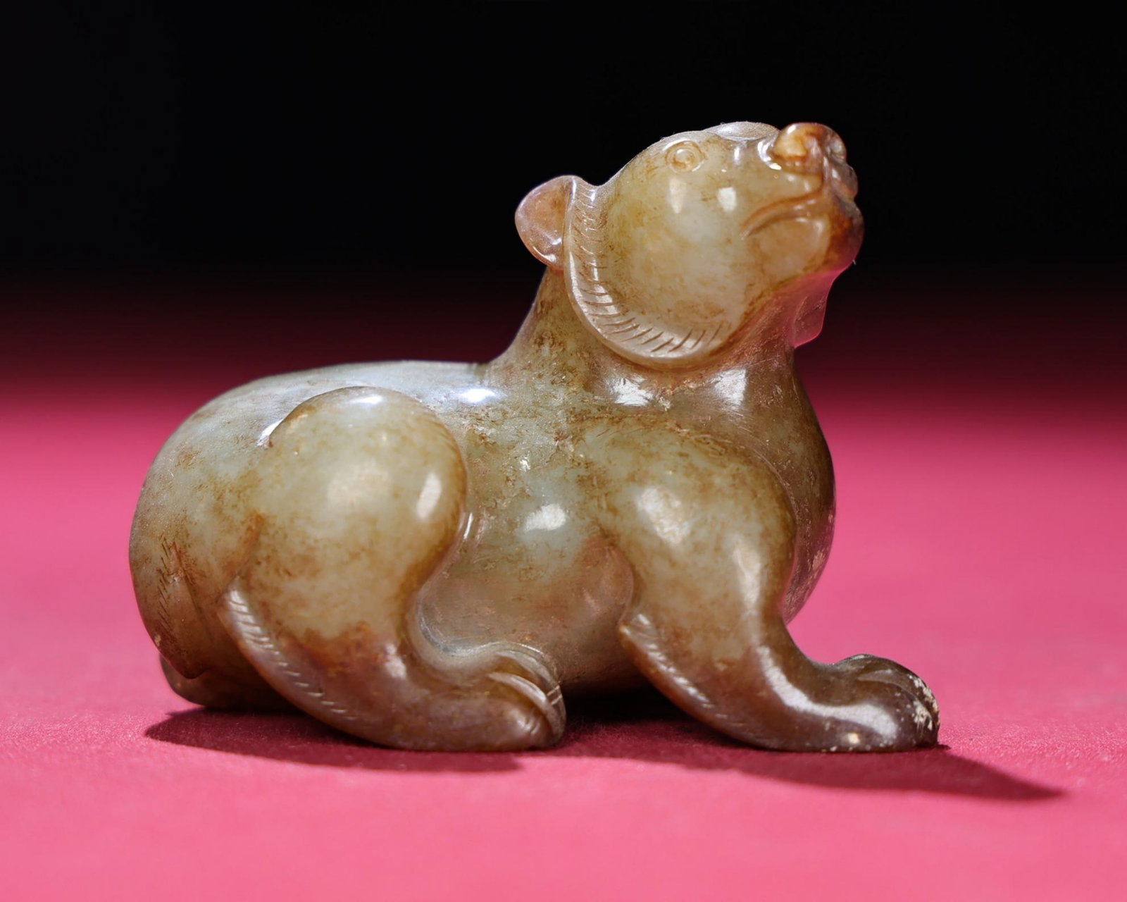 A Chinese Carved Jade Bear Statuette: Lg. 7.5cm, Wd. 4cm, Th. 5.5cm, Wt. 19.6g