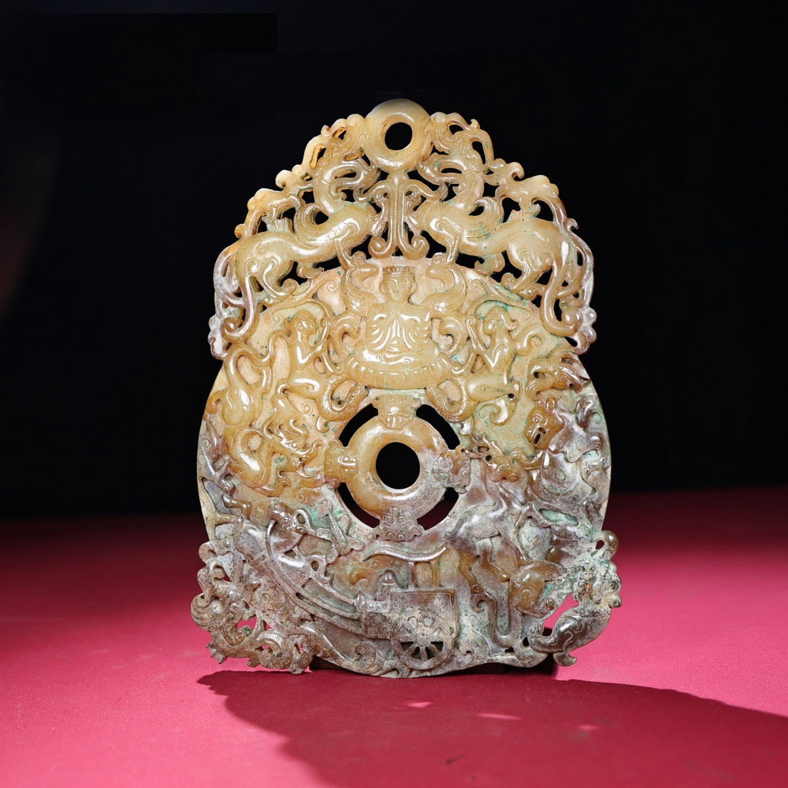 A Chinese Carved Jade Pendant: Ht. 21.2cm, Wd. 17cm, Th. 1.1cm, Wt. 665g