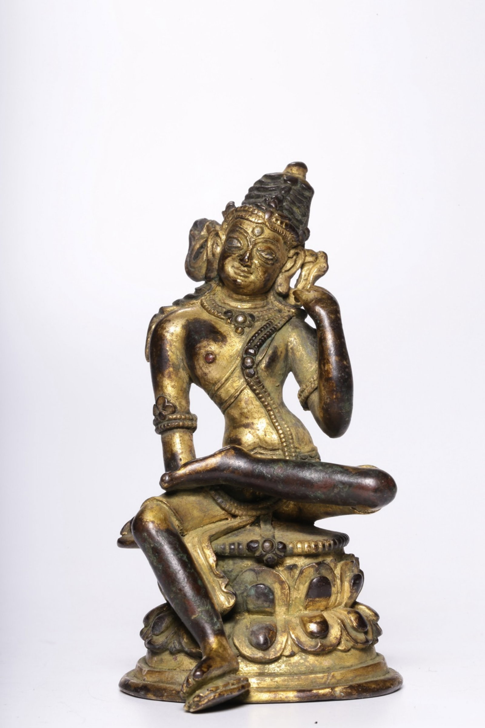 A Chinese Gilt Bronze Figure of Buddha: Ht. 8.8cm, Lg. 5cm, Wd. 4.5cm, Wt. 186g