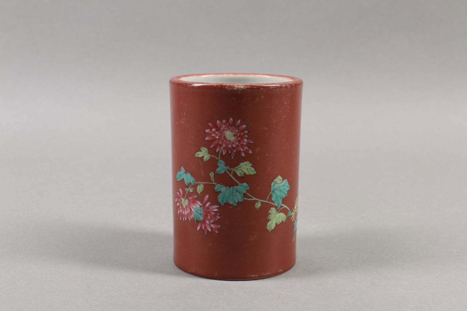 A Chinese Red Ground Famille-Rose Porcelain Brush Pot (1 of 6)