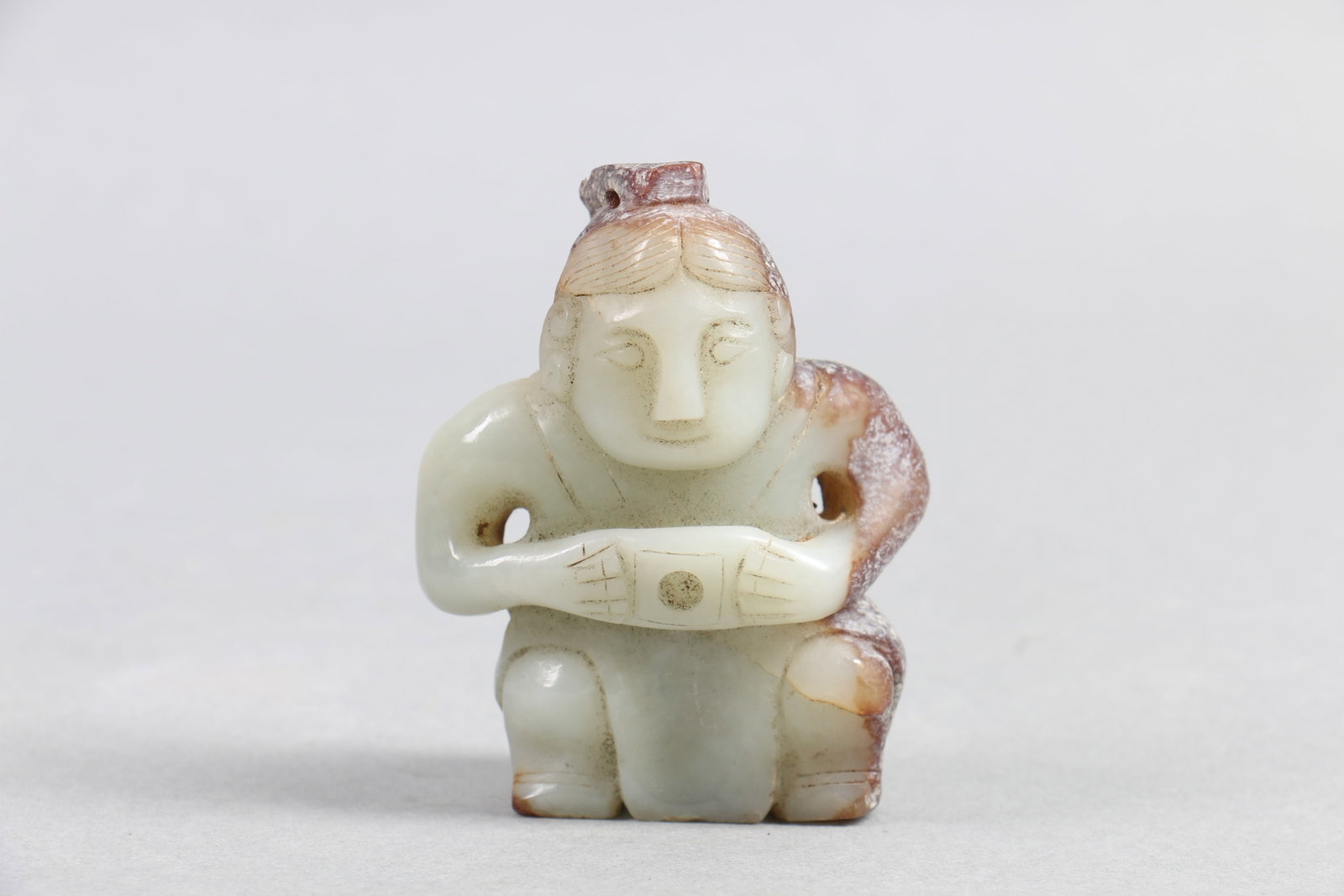 A Chinese Carved Jade Decoration: Wt. 113g, Ht. 6.6cm