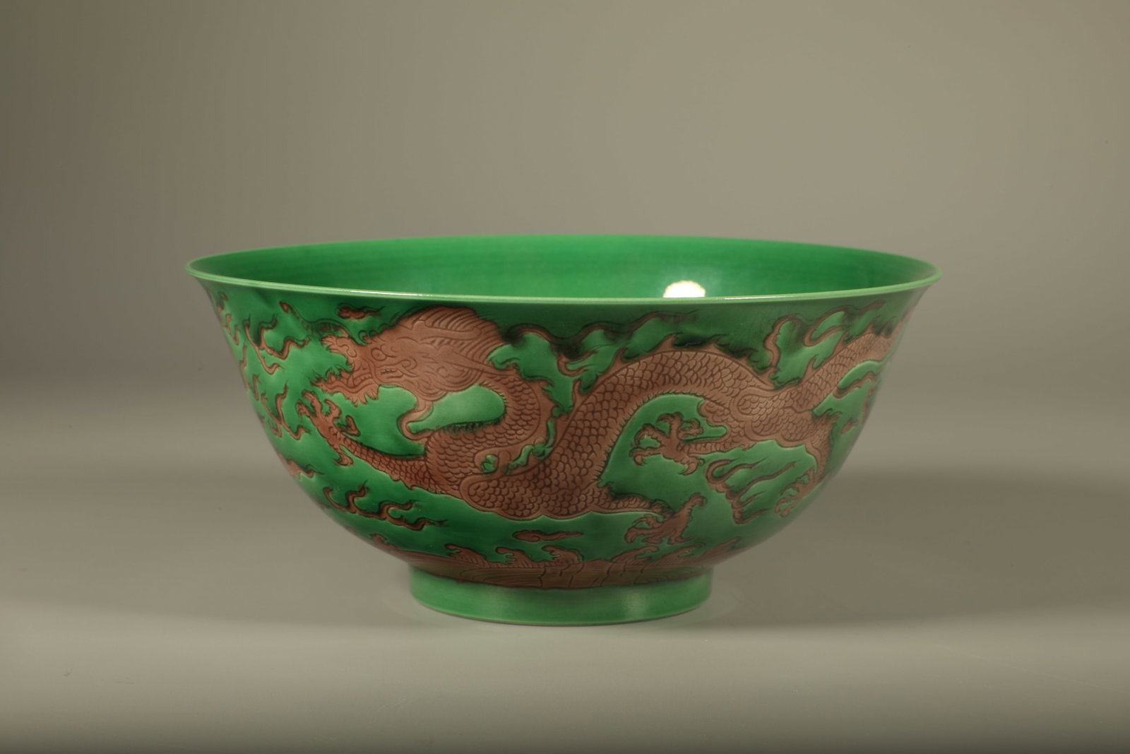 A Chinese Green Ground Purple Glazed Dragon Porcelain Bowl: Diam. 14.8cm, Ht. 6.6cm