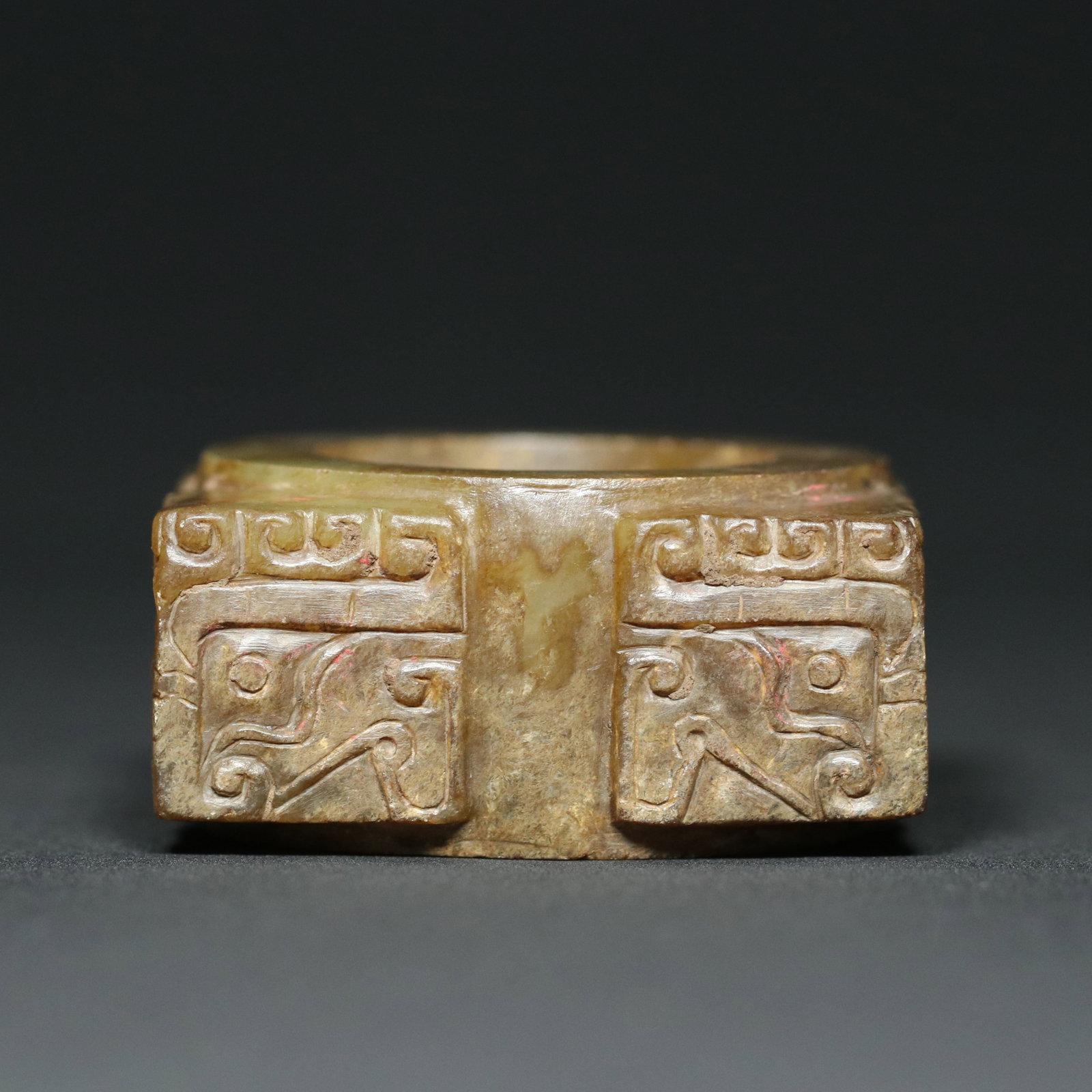 A Chinese Carved Jade Cong Bead: Lg. 5cm, Wd. 4.9cm, Th. 2.5cm, Wt. 111.8g
