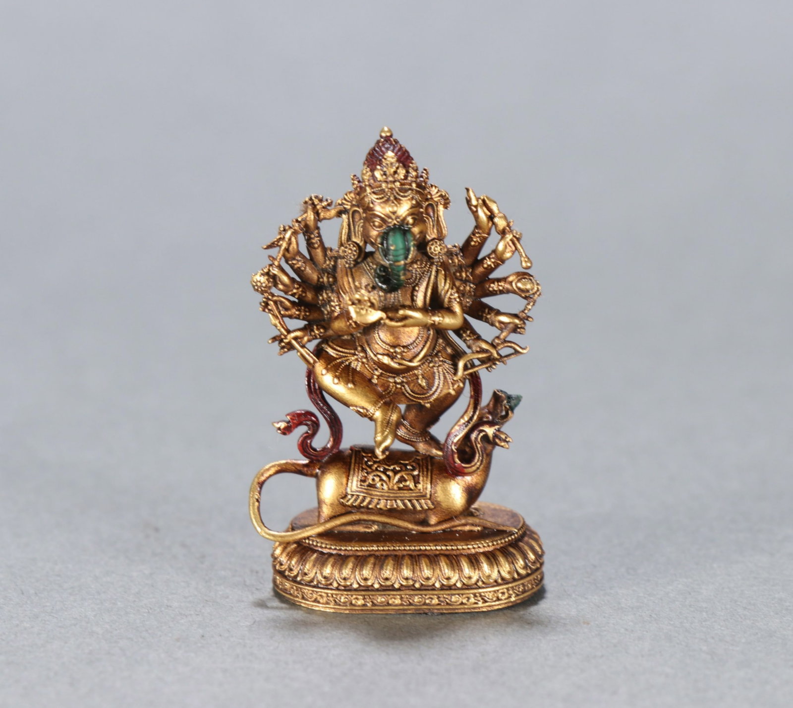 A Chinese Gilt Bronze Figure of Buddha: Ht. 3.7cm, Wd. 2.4cm, Wt. 16.7g