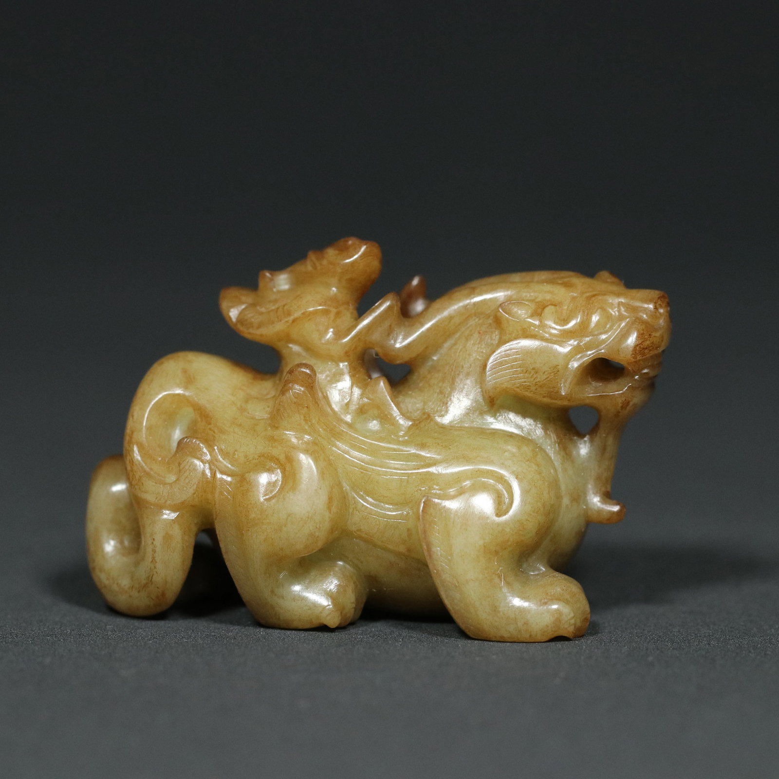 A Chinese Carved Jade Foo-Dog Statuette (1 of 9)