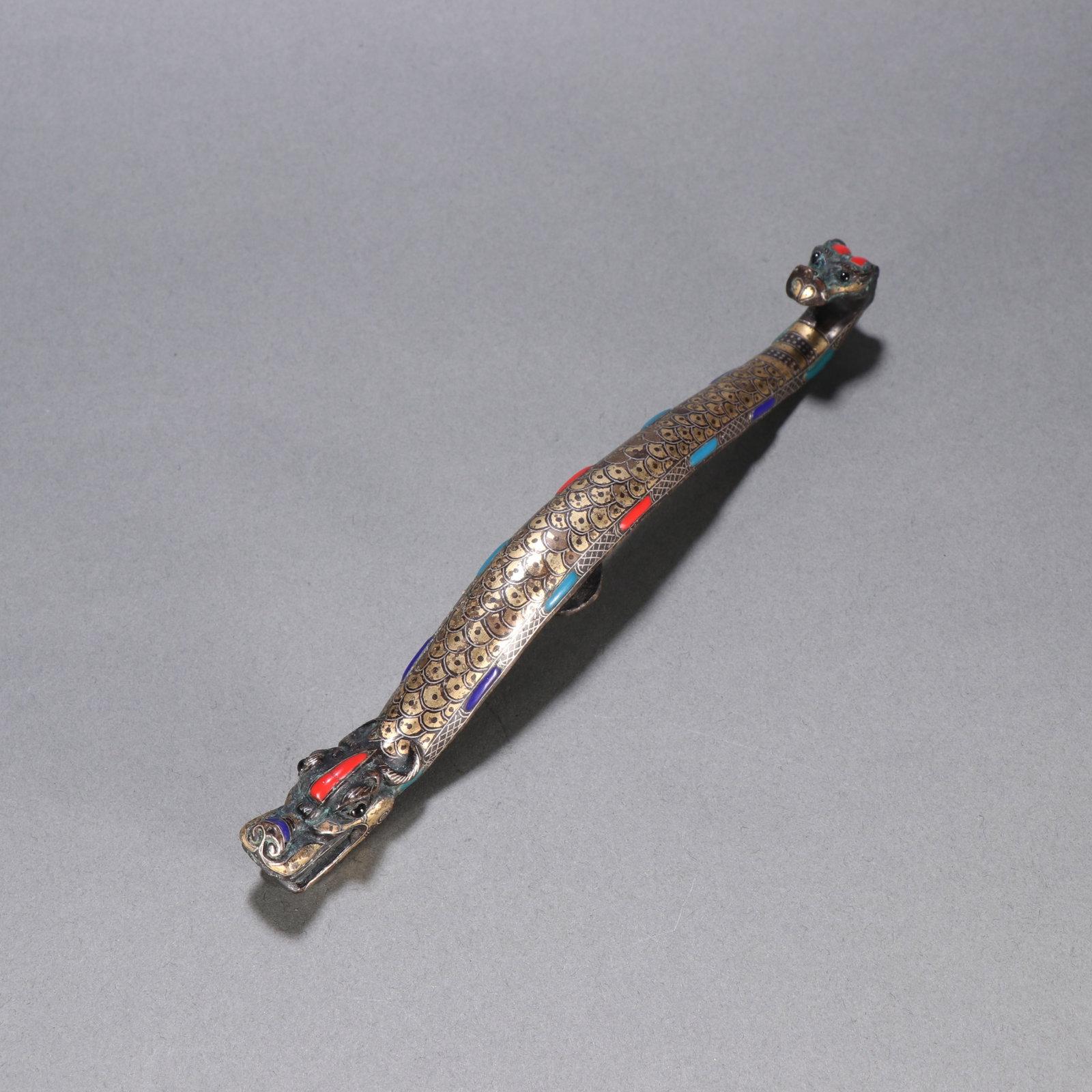 A Chinese Gilt Bronze, Silver and Gold Belt Buckle: Lg. 19.3cm, Wd. 1.8cm, Wt. 232.8g