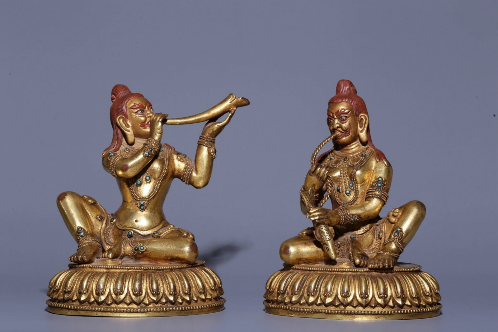 A Pair of Chinese Gilt Bronze Figures of Buddha: Ht. 16cm, Lg. 12cm, Wd. 95cm, Wt. 3095g