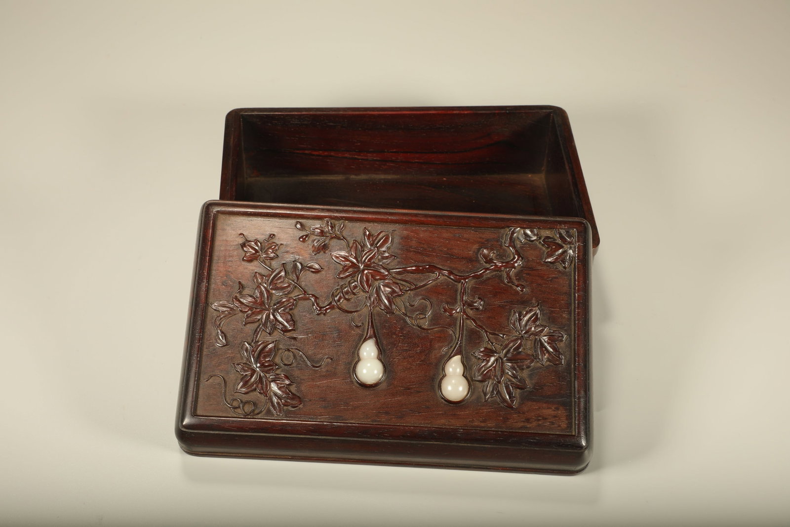 A Chinese Carved Hardwood Box with Lid and Jade Inlaid: Lg. 18.5cm, Wd. 11.5cm, Ht. 8.5cm