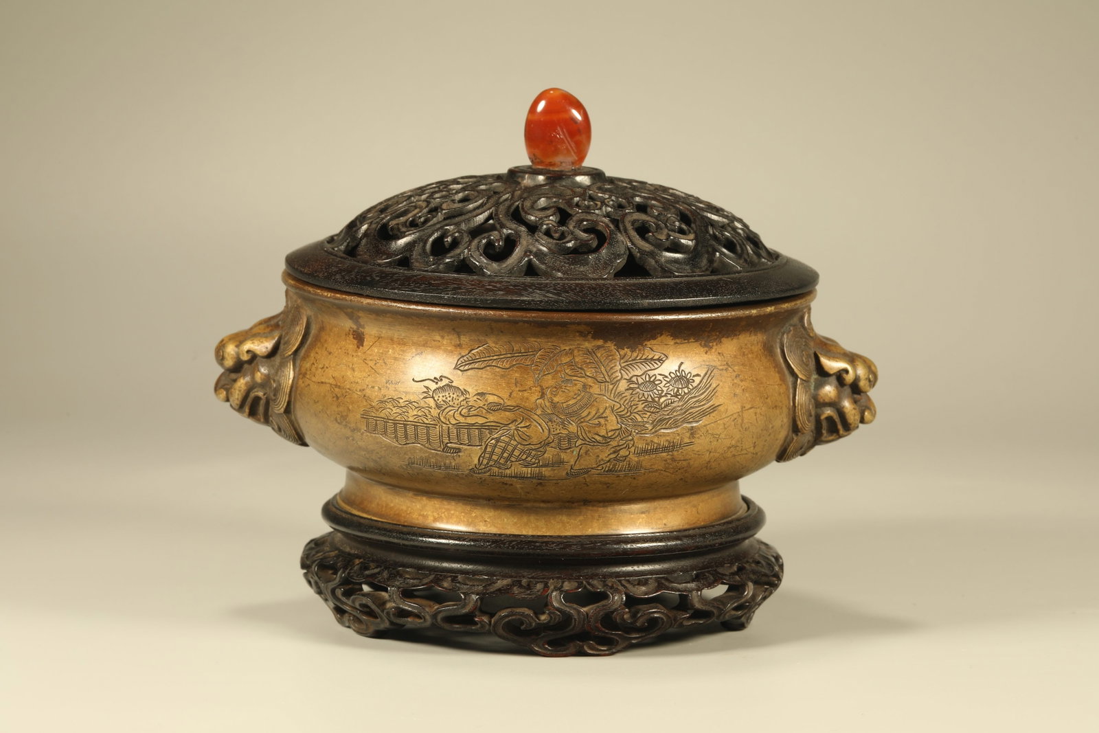 A Chinese Bronze Incense Burner with Carved Hardwood Lid, Stand, and Agate Handle: Ht. 13cm, Diam. 16cm