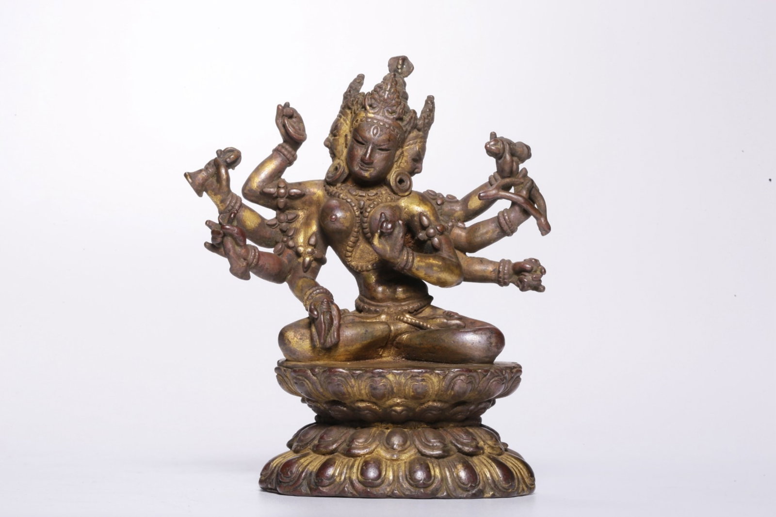 A Chinese Gilt Bronze Figure of Buddha: Ht. 7.8cm, Lg. 65cm, Wd. 2.8cm, Wt. 187g