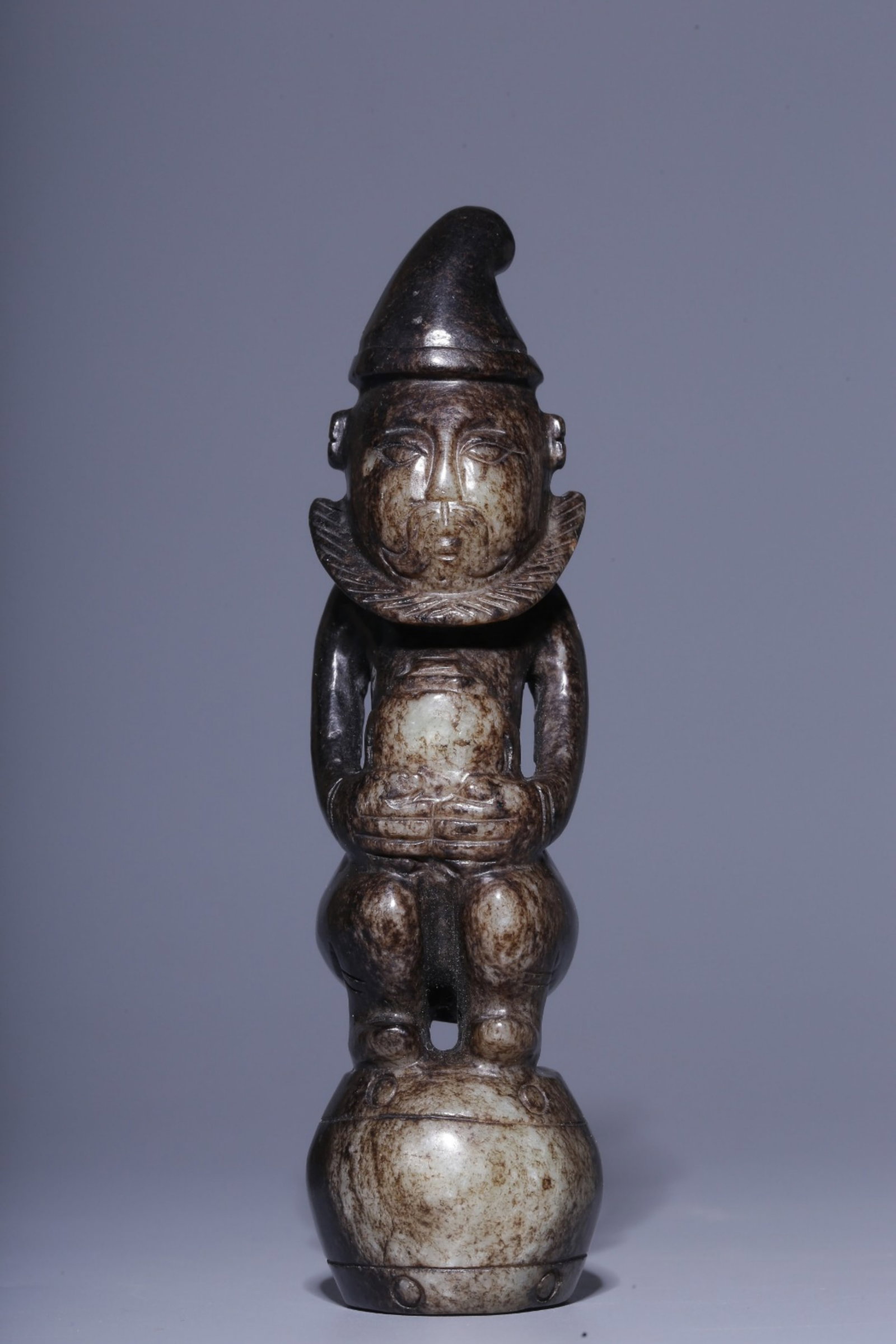 A Chinese Carved Jade Figure of Non-Han People: Ht. 13cm, Diam. 3.5cm, Wt. 189g