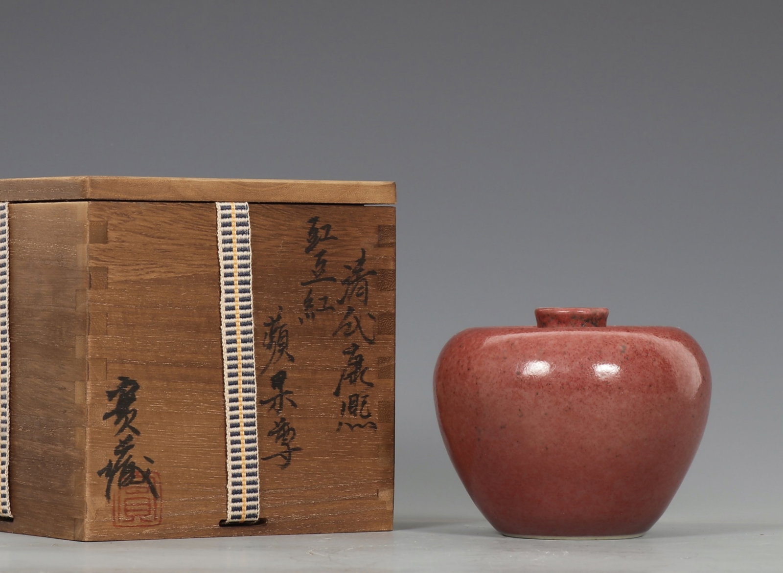 A Chinese Bloom Peach Glazed Porcelain Jar: Ht. 9cm, Diam. 2.5cm, Diam. 11cm