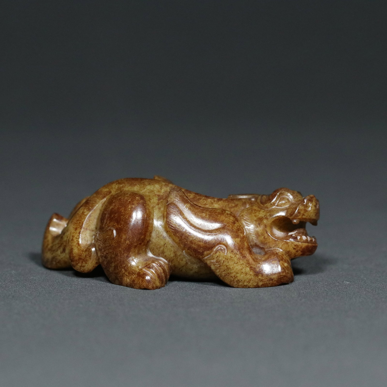 A Chinese Carved Jade Foo-Dog Statuette (1 of 9)