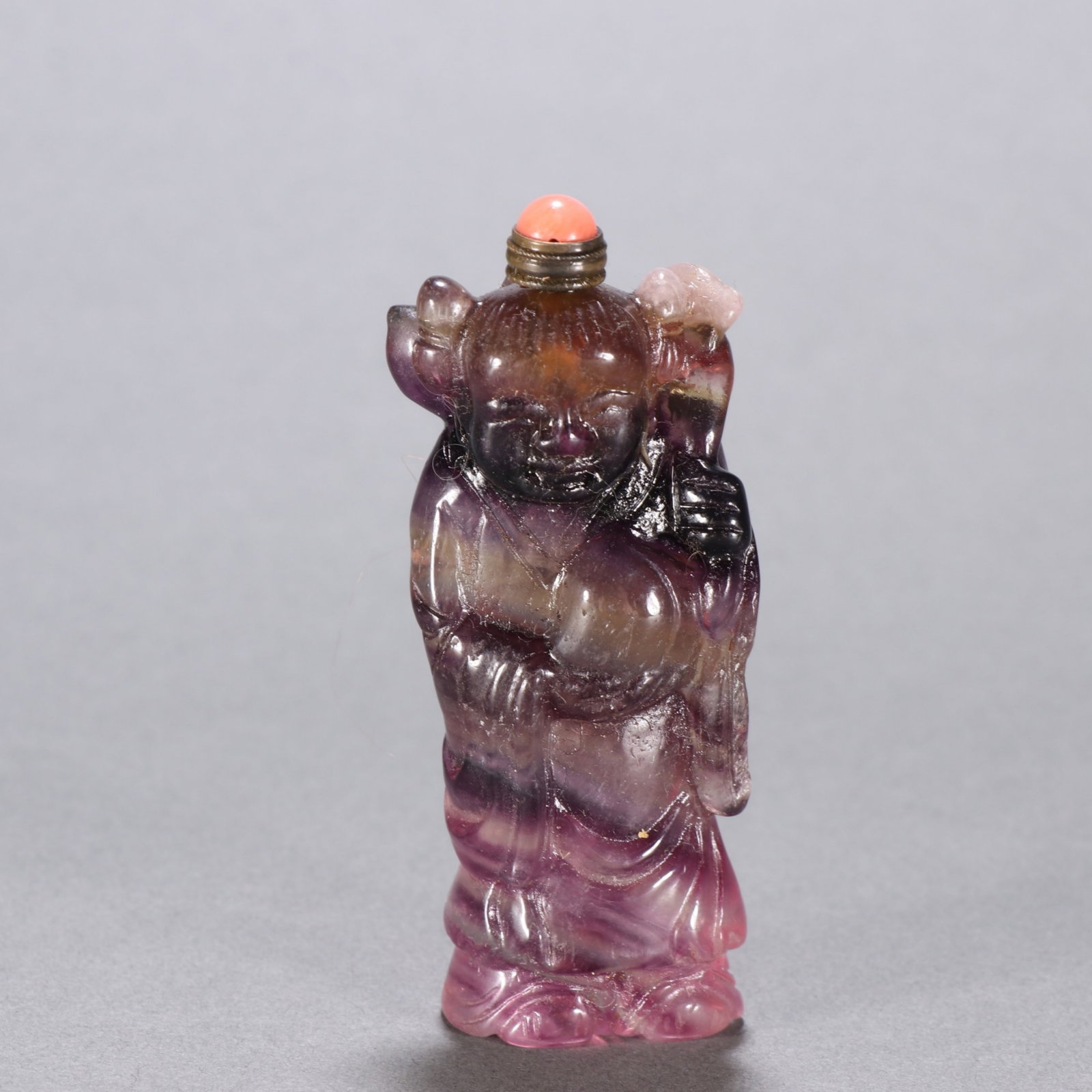 A Chinese Carved Rock Crystal Snuff Bottle: Ht. 8.9cm, Wd. 3.5cm, Wt. 121.3g