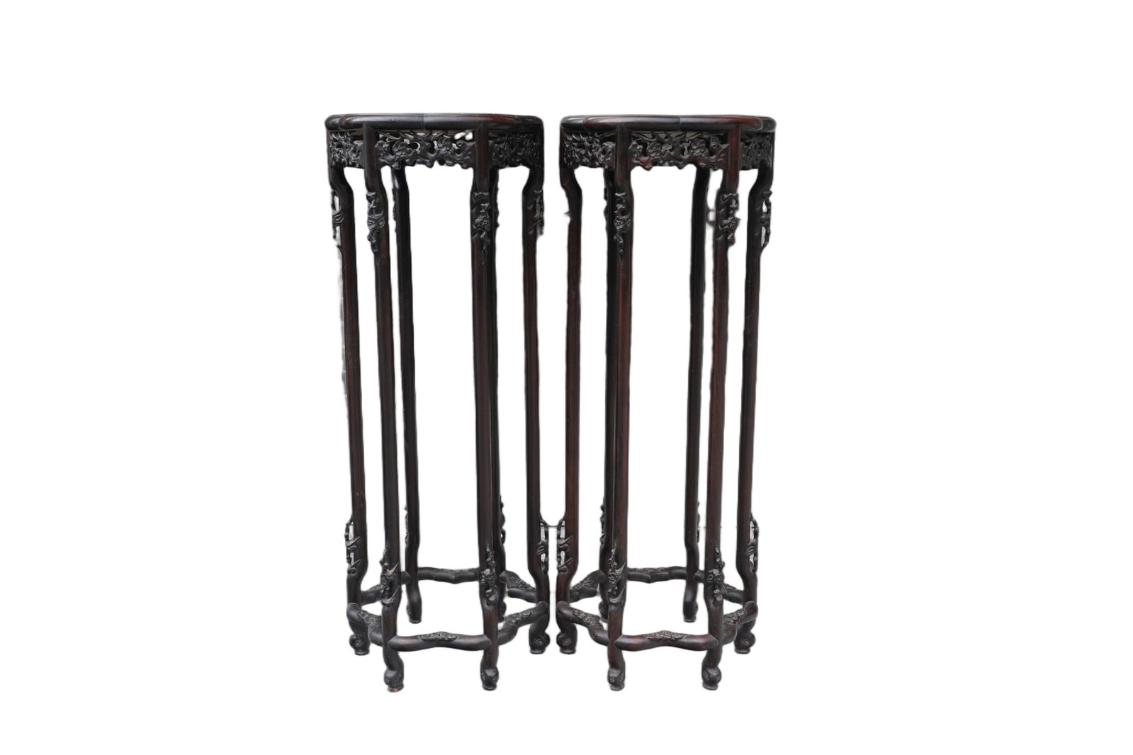 A Pair of Chinese Carved Hardwood Stands: Ht. 111cm, Diam. 42cm