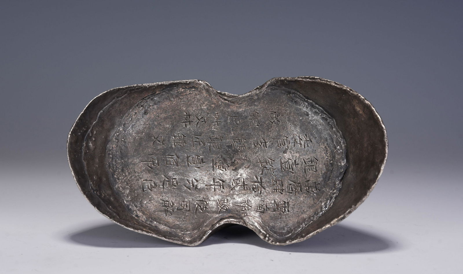 A CHINESE SILVER INGOT (1 of 10)