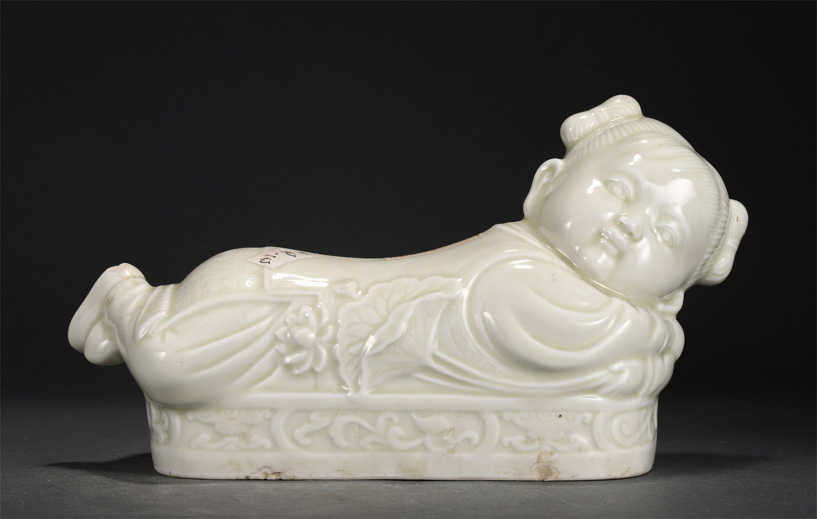 A CHINESE DING TYPE GLAZED PORCELAIN PILLOW (1 of 9)