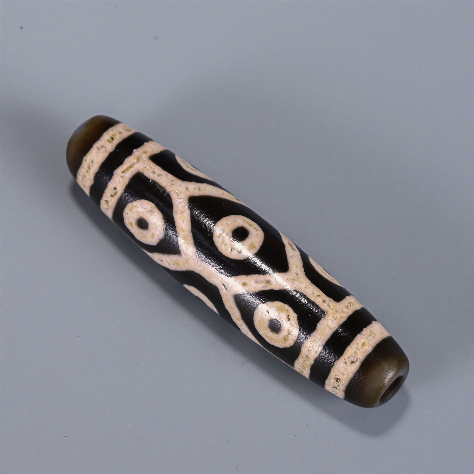 A CHINESE DZI BEAD (1 of 5)