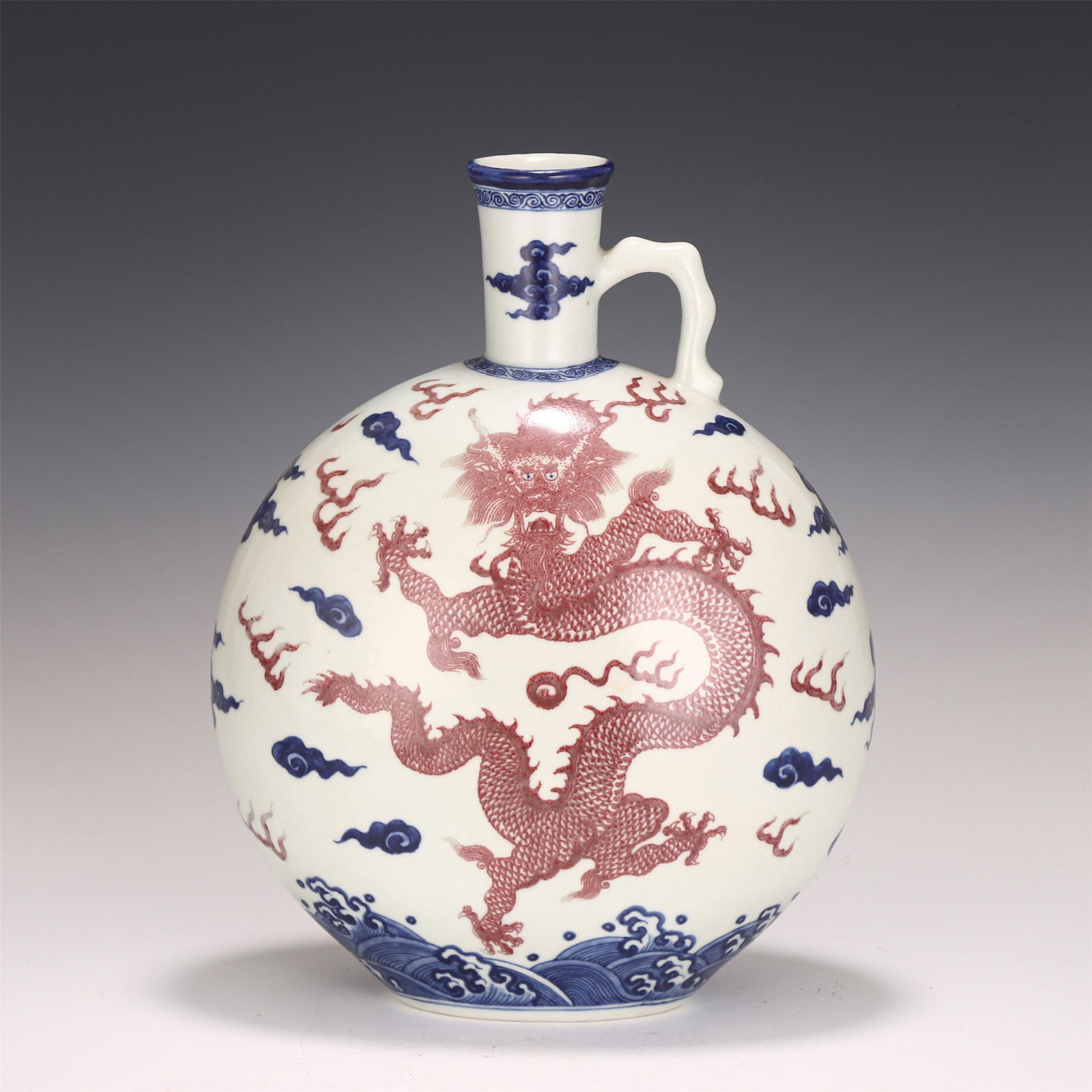 A CHINESE BLUE AND WHITE UNDERGLAZE RED PORCELAIN VASE (1 of 9)
