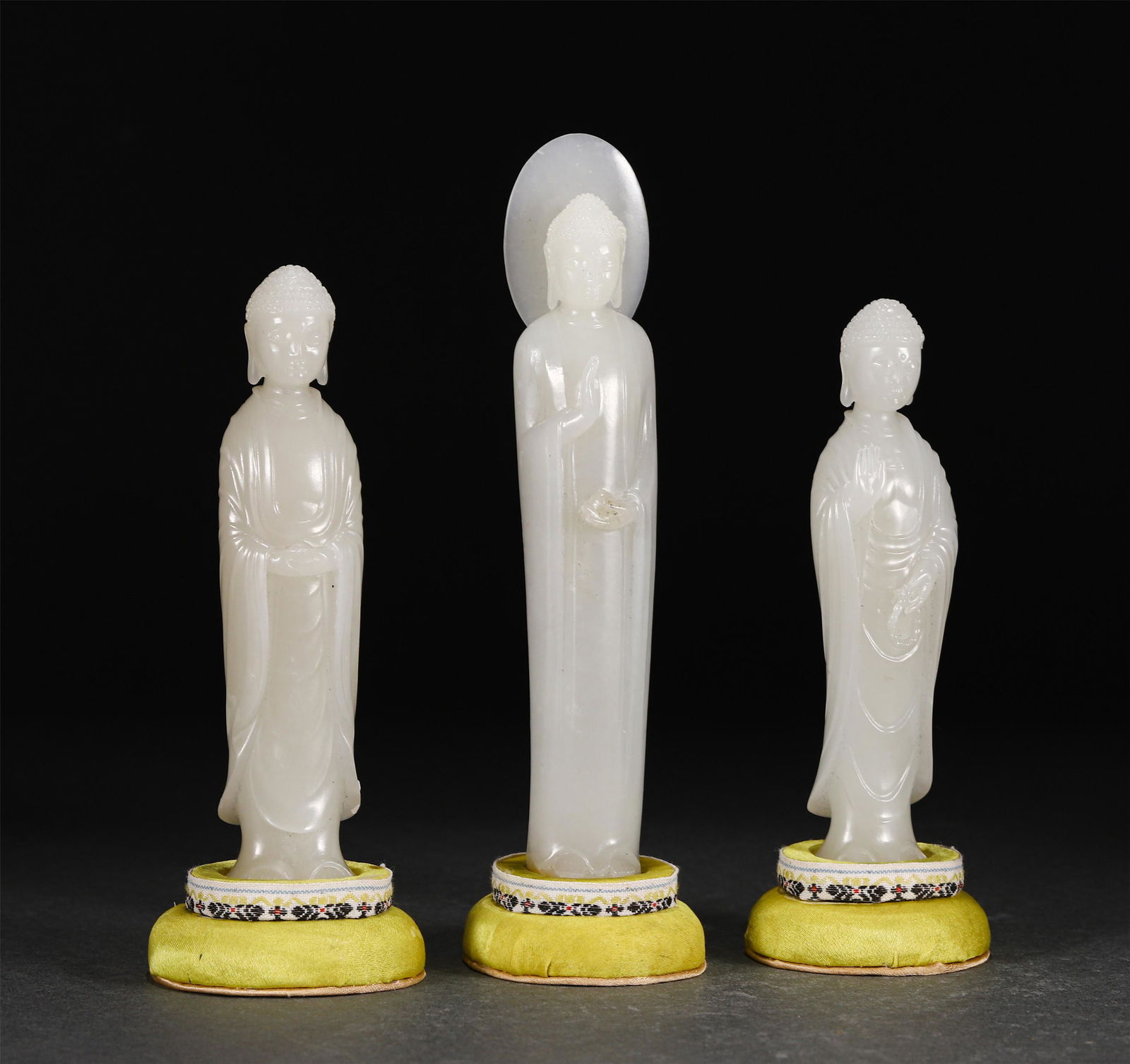 A GROUP OF THREE CHINESE JADE CARVED BUDDHAS (1 of 10)