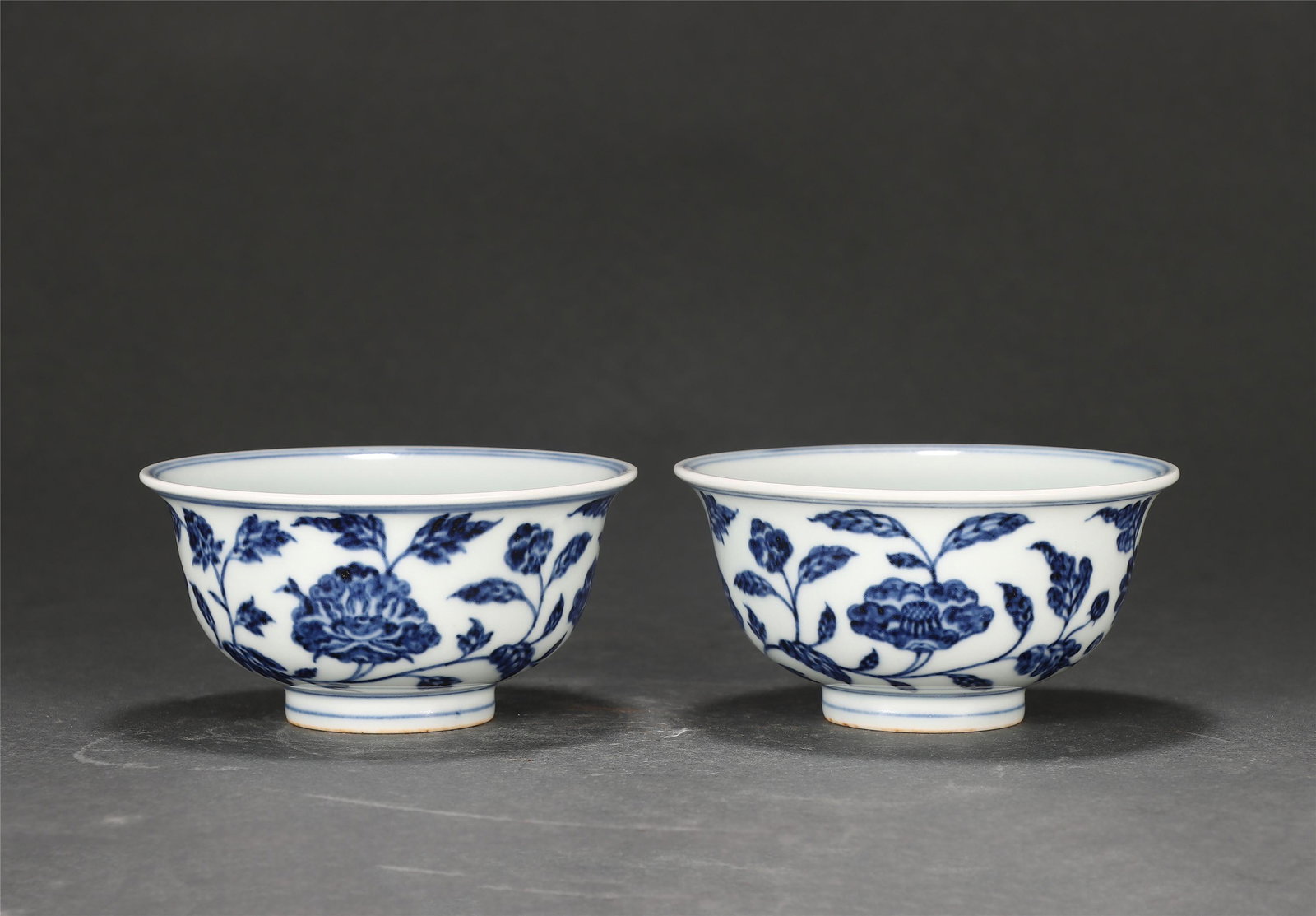A PAIR OF CHINESE BLUE AND WHITE PORCELAIN FLOWERS CUPS (1 of 9)