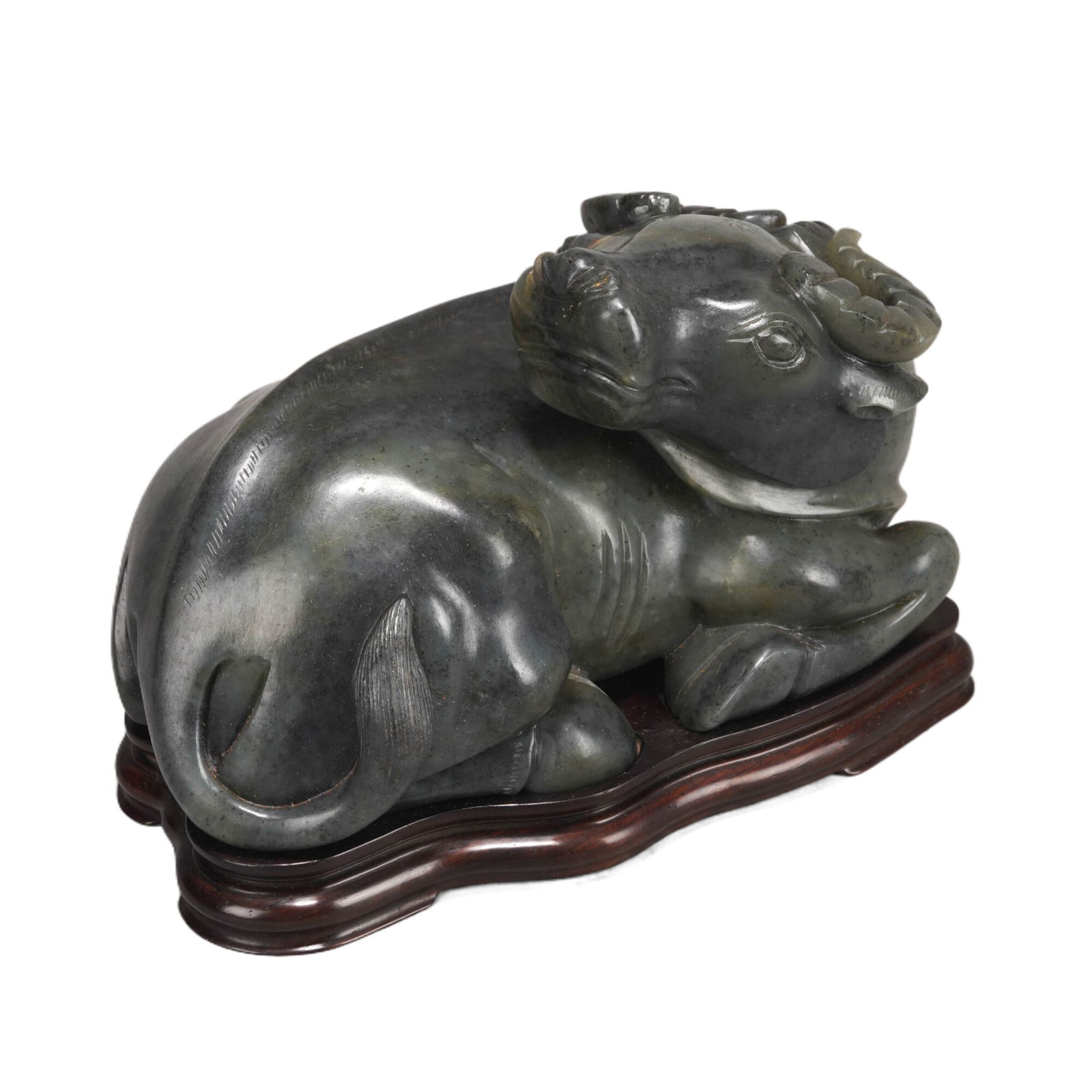 A CHINESE CARVED JADE RECUMBENT BUFFALO (1 of 10)