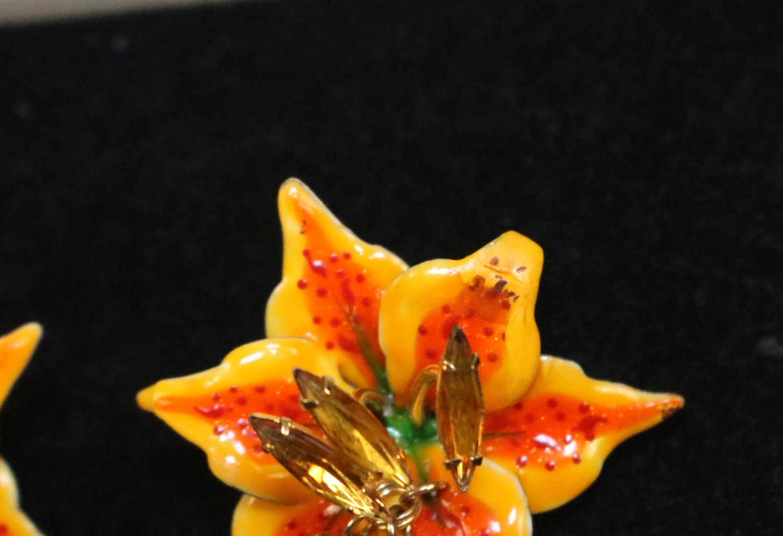 Lunch At The Ritz 24kt gold plate USA Lilly earrings: Lovely enamel orange, yellow and red with loads of Austrian crystals. Bright gold no gold loss. PLEASE NOTE One petal appears to have been touched up. It's hard to tell from any distance wearing them.