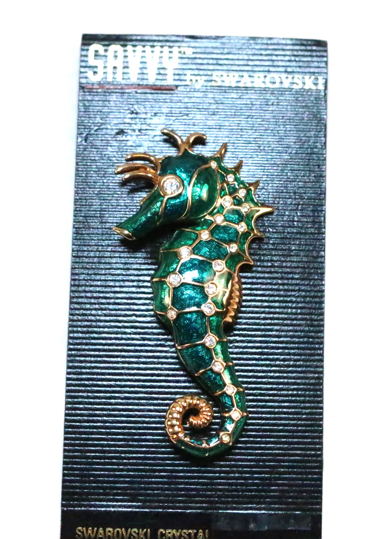Swarovski Enamel Crystal Large Seahorse Brooch: Brand NEW on the Card SAVVY by Swarovski Bright Green enamel fabulous gold tone details wit bright clear Swarovski Crystals sparkling like diamonds Brooch is 2.5 long x 1.5" wide. PERFECT