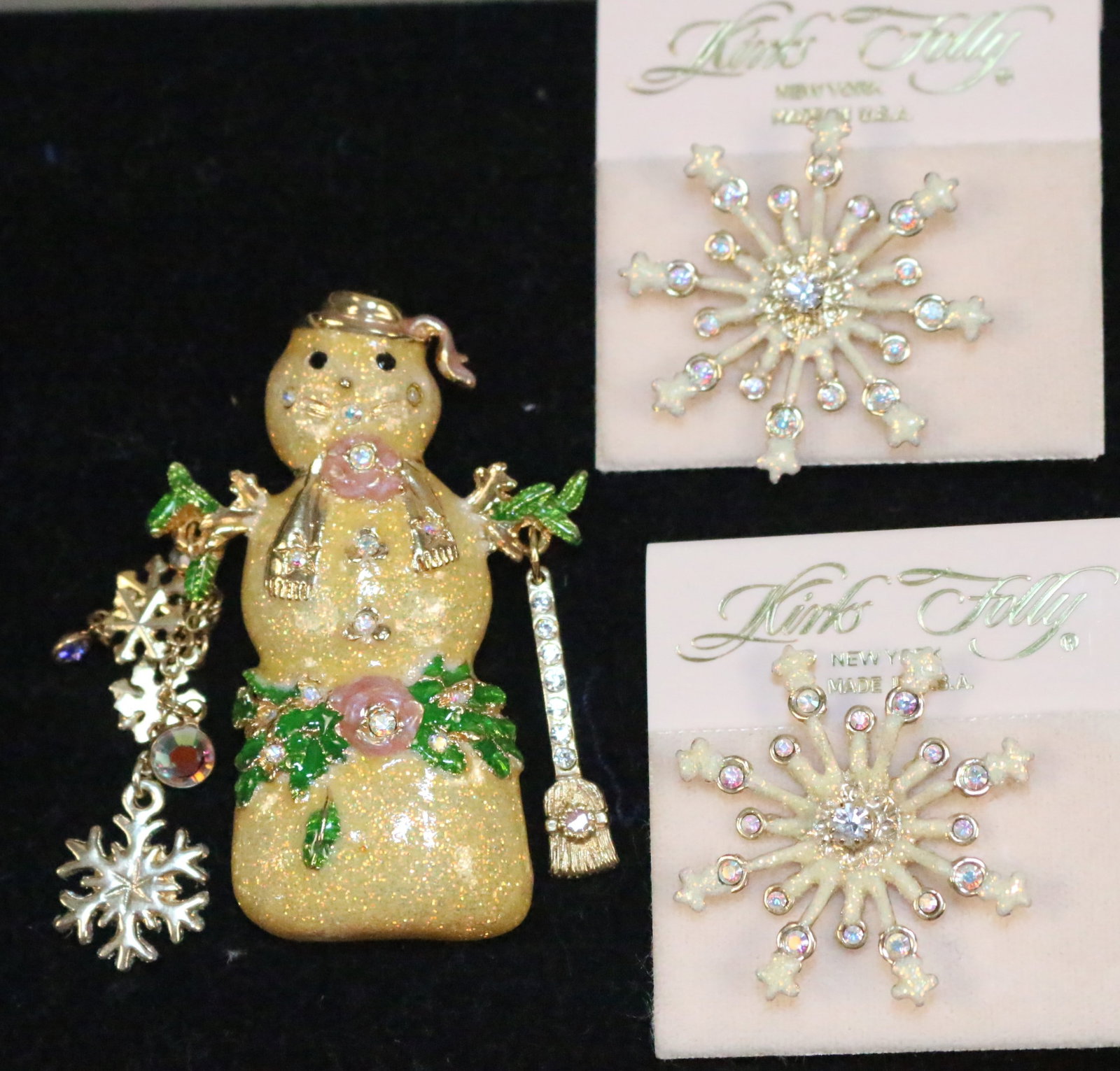 Kirks Folly Lot of NEW USA Snowflakes & Snowman brooches.: Lot of 2 NEW on the card USA NEW YORK Kirks folly crystal snowflakes and 1 large snowman brooches. Snowman measures over 2.5" long. Snowflakes are 1.5" diameter. PERFECT condition. All signed KIRKS FO