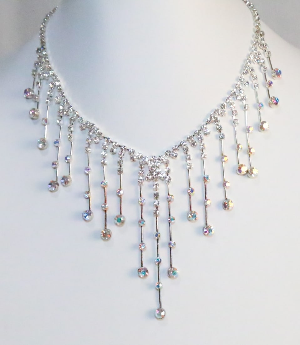 New Kirks Folly Crystal Holiday Bridal Drape Necklace: Stamped: Kirks Folly Dripping long strands of crystals on a crystal silver tone setting. DIMENSIONS: Center drop 3". Necklace chain length 15"-18" with chain extender.
