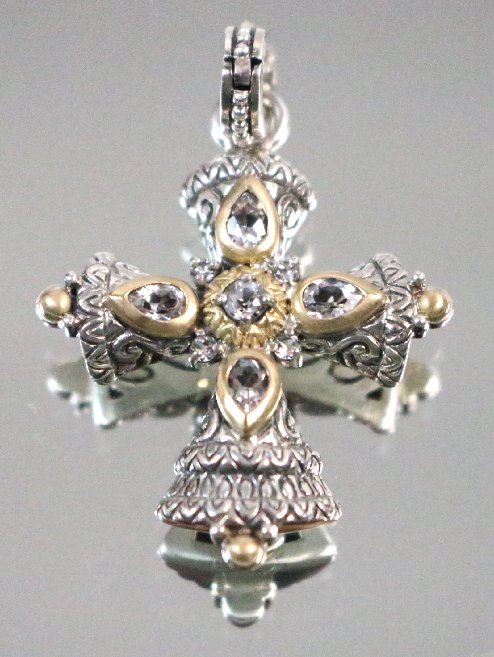 Barbara Bixby Sterling Silver 18kt Gold Maltese Cross Pendant Enhancer: Stamped: Bixby 925 18kt. THAILAND. White topaz stones, 18kt gold ball ends and setting around all of the 5 larger topaz. Etched sterling. DIMENSIONS: 1-1/4" x 1-1/4" with 1-3/4" drop with bale.