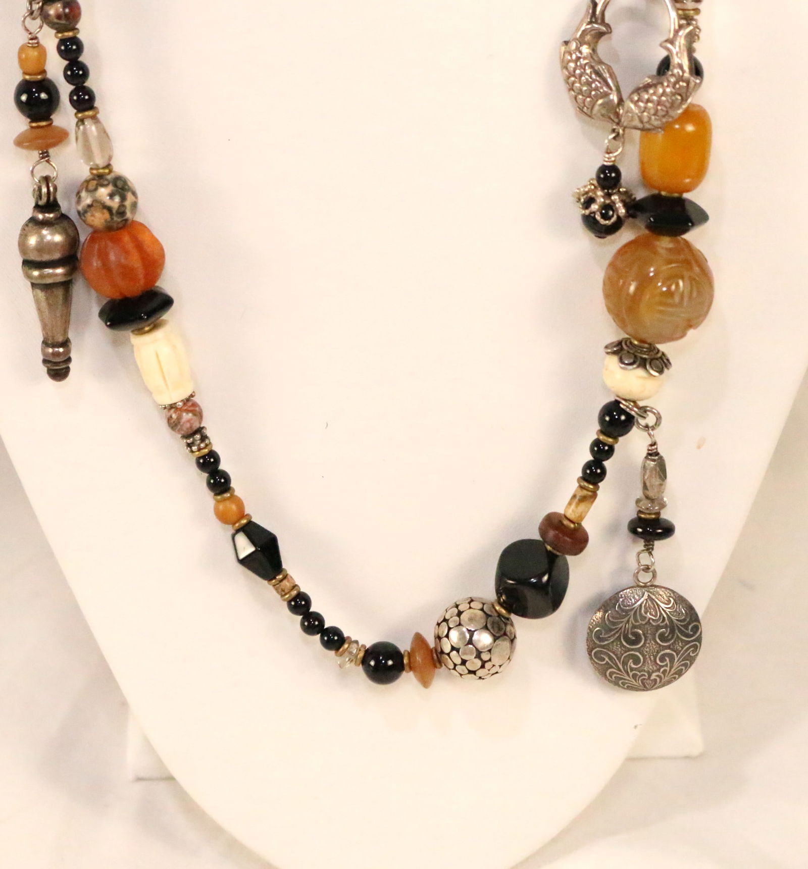 Native American Southwest Peyote Bird Sterling Silver Stone Amber Sterling Silver Necklace: SIGNED: Peyote Bird Sterling Hang Tag DETAILS: Fabulous long necklace loaded with sterling silver charms, genuine stone beads in black onyx, carved quartz, amber, carved bone, quartz, Jasper, agate, a