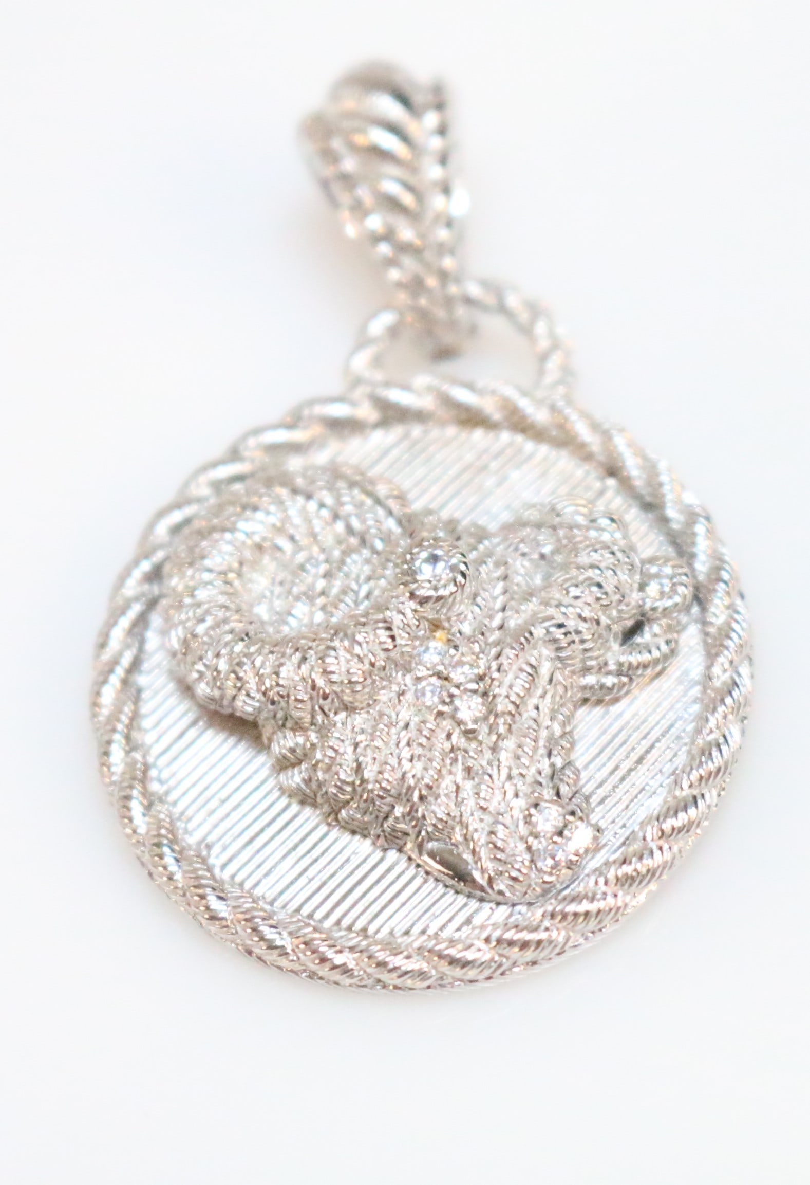 NEW Judith Ripka Sterling Silver Taurus the Bull Zodiac Archer Large Pendant Enhancer: SIGNED: JUDITH RIPKA CZ 925 THAILAND. DETAILS: BRAND NEW. Judith Ripka Taurus Astrology Zodiac Sign The Bull. Diamonique Simulated diamonds. Snap hinge closer with a rope border. Rope border around th