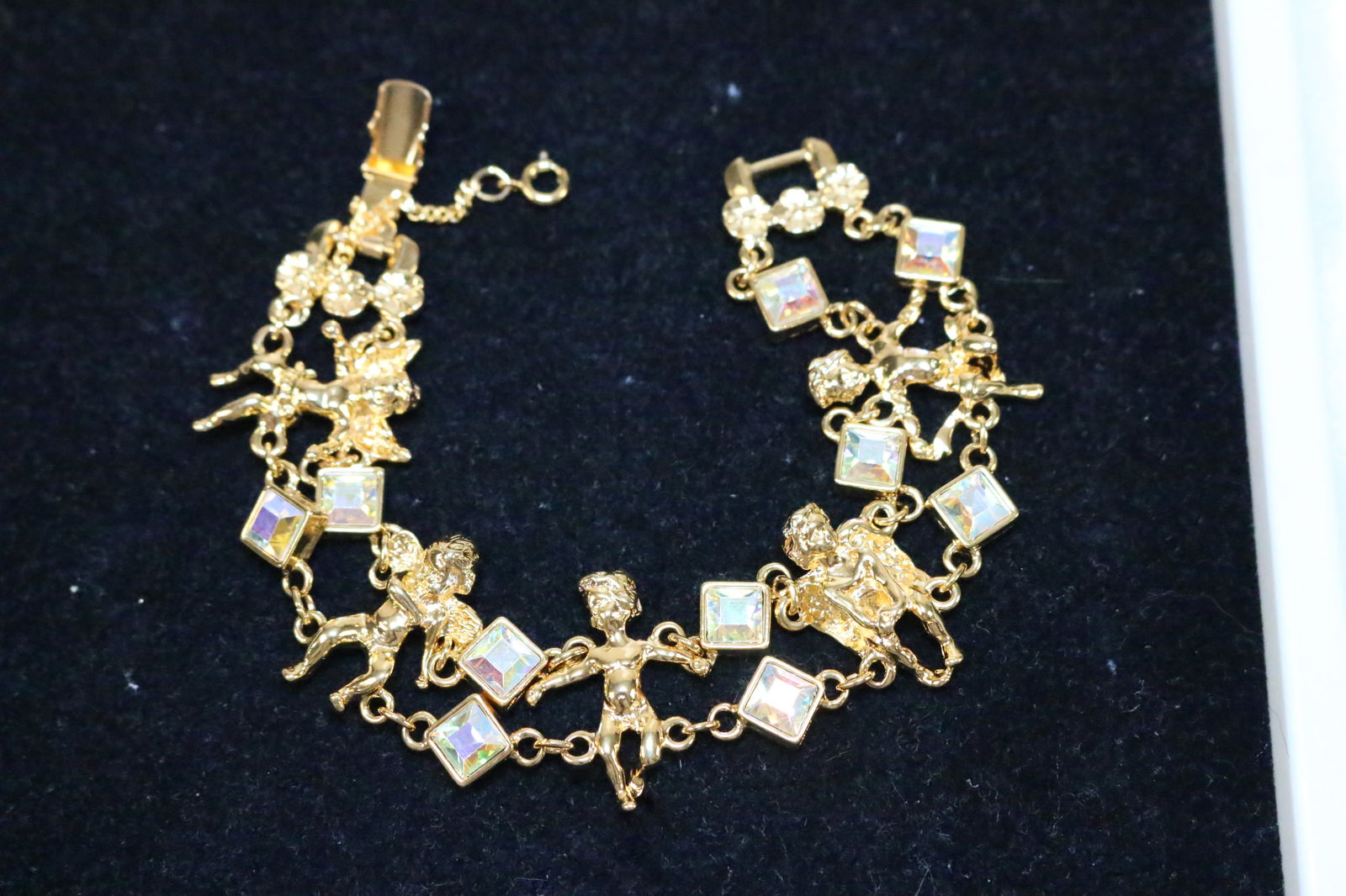 NEW Kirks Folly Cherub Movement crystal gold tone bracelet. 8" in box (1 of 2)