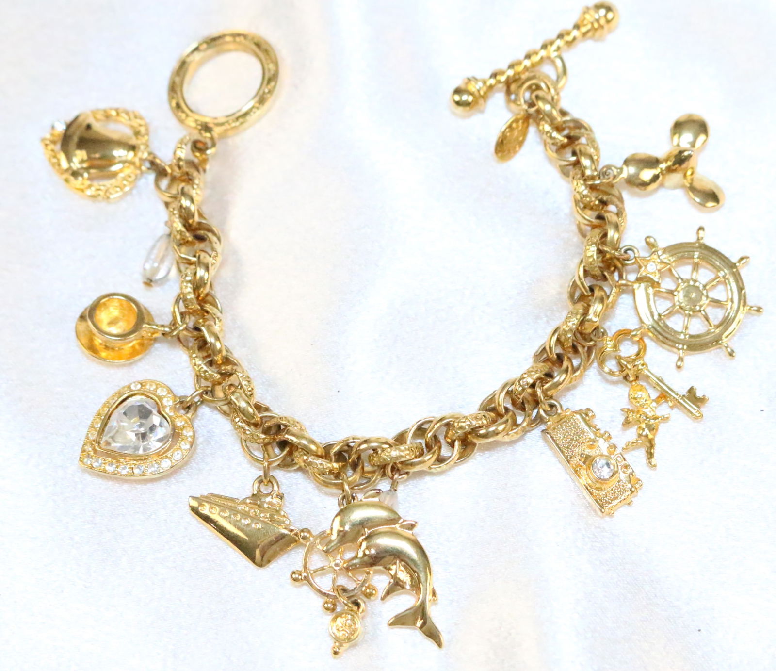 Kirks Folly Heavy charm bracelet, nautical cruise travel gold tone toggle. (1 of 4)