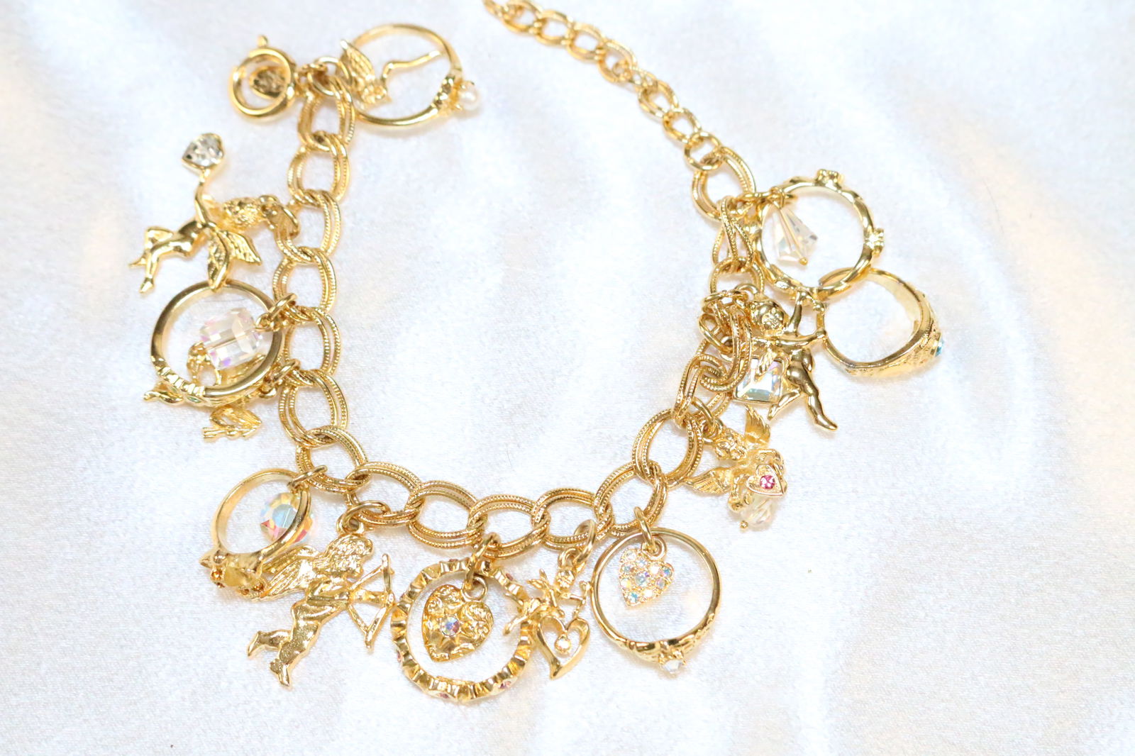 NEW Kirks Folly  bright gold tone love ring love cherubs heart charm bracelet (1 of 3)