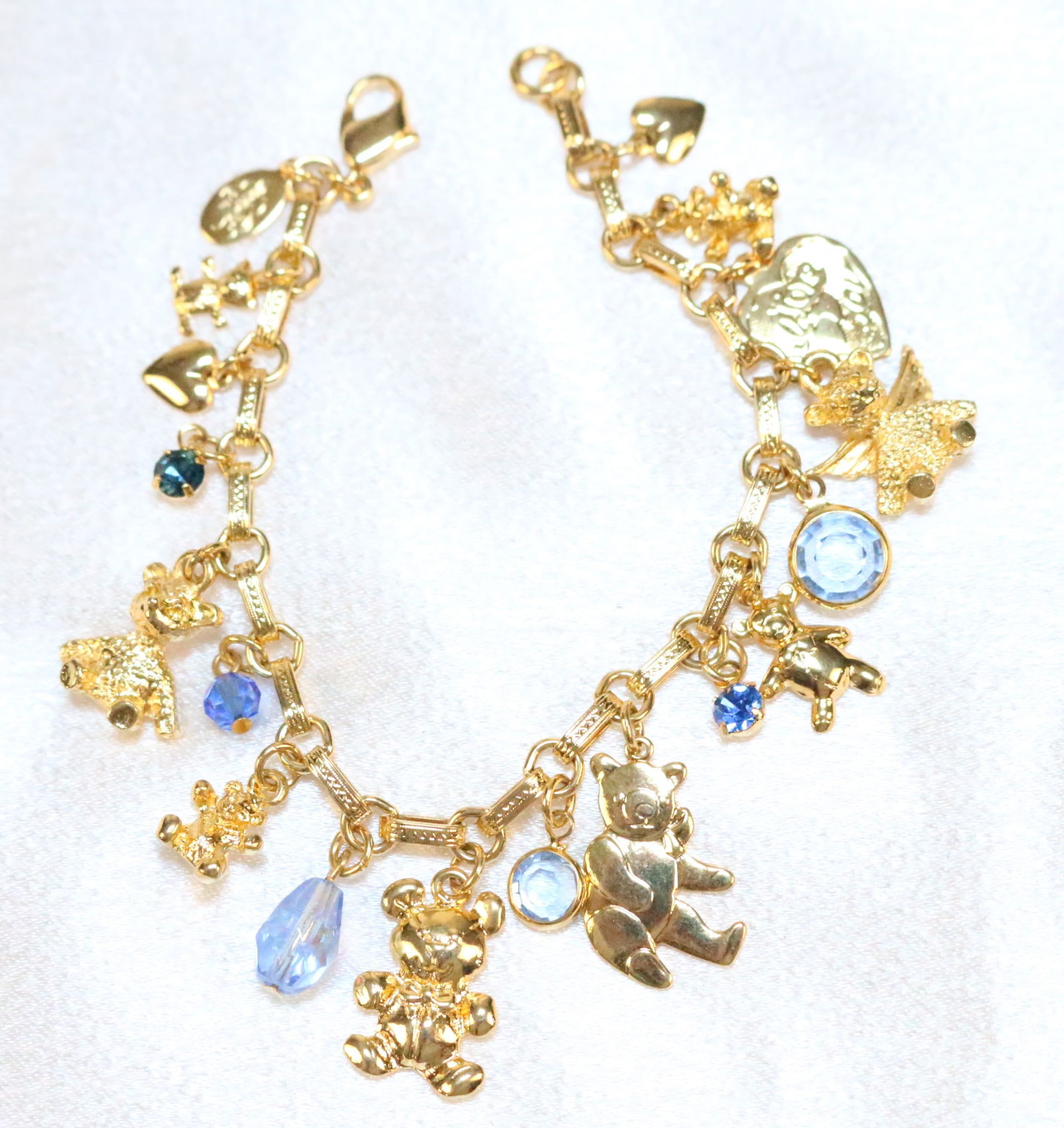 NEW Kirks Folly bright gold tone teddy bear hearts crystal charm bracelet (1 of 3)