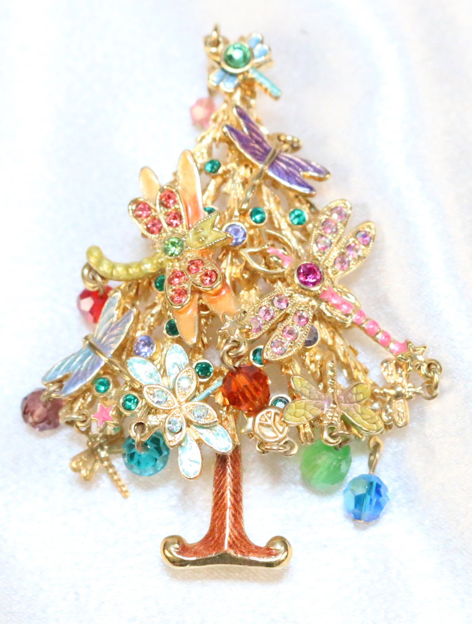 Kirks Folly Large Dragonfly Christmas Tree Brooch Pendant: DESCRIPTION: Brooch or pendant. Large with dragonflies, crystals, flowers. Signed Kirks Folly. DIMENSIONS: 2.75"h x 2" w. plus additional dangling crystals.