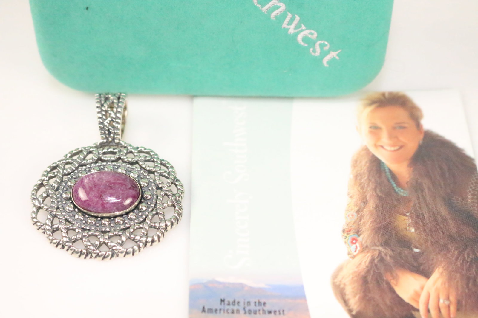 Brand New Carolyn Pollack Sincerely Southwest Purple Large Solid sterling Pendant: DESCRIPTION: *PLEASE READ! THE BLUE COLOR ON THE PENDANT IS A SHADOW FROM THE BOX. THIS IS PERFECT NEW WITH NO DISCOLORATION WHATSOEVER. NEW IN Sincerely Southwest Carolyn Pollack Velvet Box. READY TO