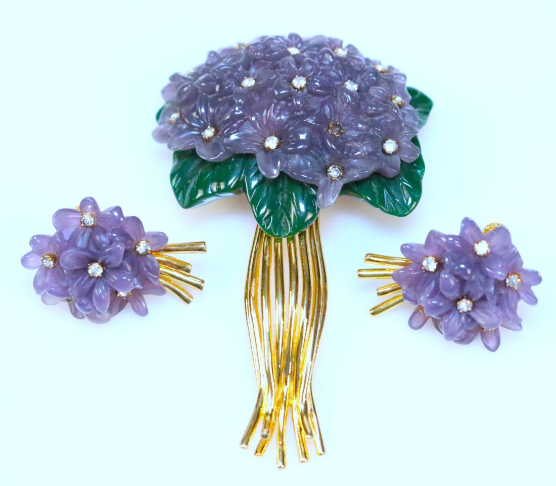 Rare vintage Joan Rivers Purple and Green Lucite Violet Flower Bouquet Brooch/Pin & Earrings Set: DESCRIPTION: SUPER RARE TO FIND THE SET! JUST THE BROOCH IS $225 ONLINE not including the earrings! DIMENSIONS: 3.25" x 2" Brooch. Earrings are screw back and measures 1" x 1.5".