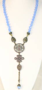 RARE Heidi Daus Deco 25" Lavalier Blue Chalcedony triple drop Necklace: DESCRIPTION: Estate LIKE NEW FABULOUS Opaque Blue Chalcedony Faceted Beads hand knotted, with a snap clasp encrusted with coordinating Swarovski crystals. The Double Teardrop pendants feature a