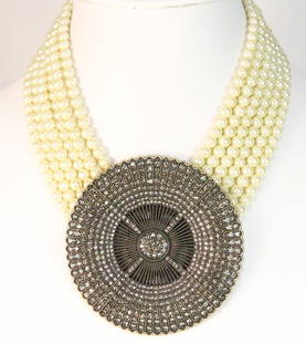 NEW HEIDI DAUS Belgium Disc Cream Ivory 6 strand Pearl HUGE Pendant Necklace: DESCRIPTION: FABULOUS Jaw Dropping 6 strands of gorgeous Cream Ivory Pearls with a large center disc Paved with brilliant graduated sizes of black diamond cut Swarovski brilliant crystals in a beaded