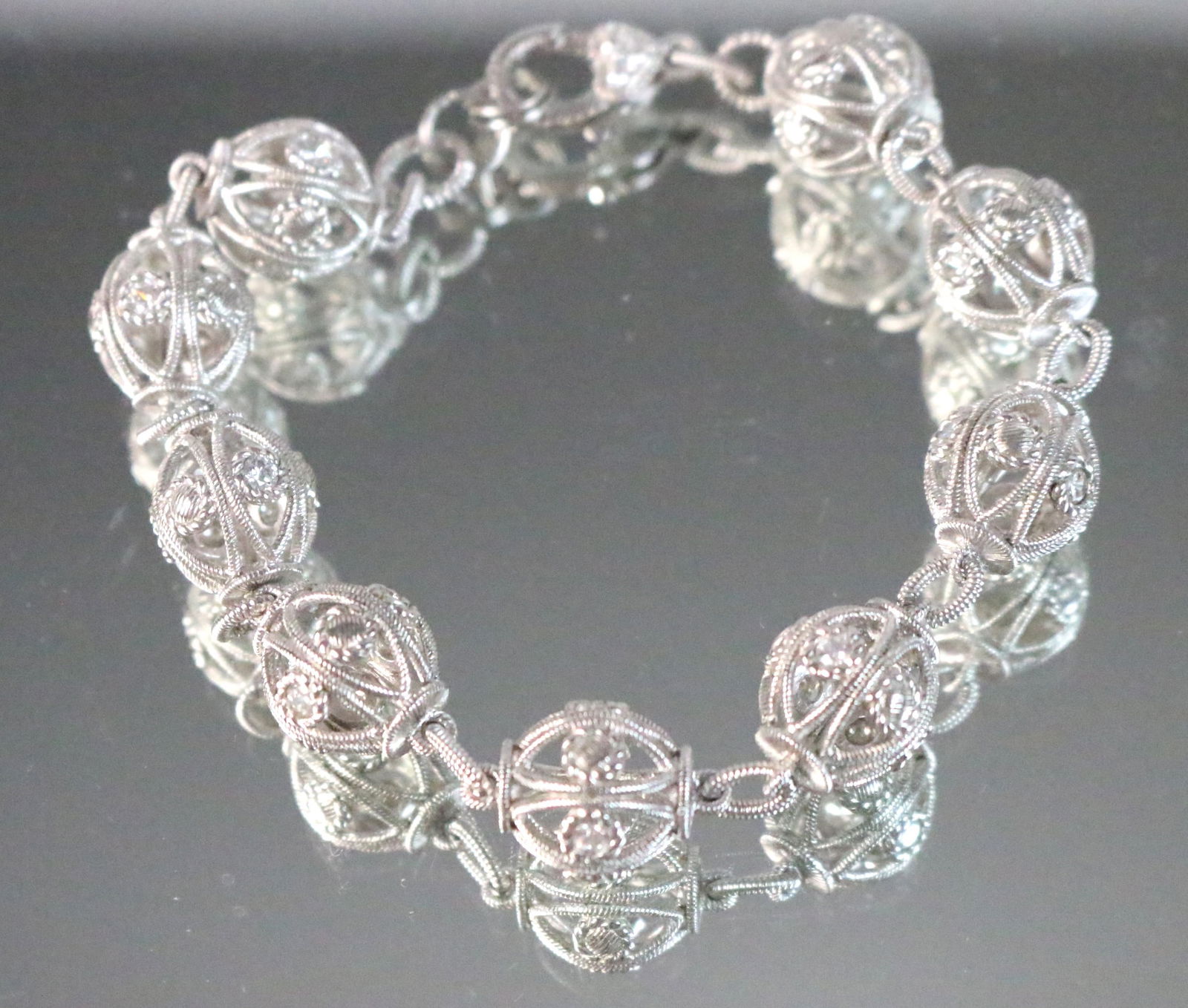 NEW Judith Ripka Sterling Silver Truffle Bead Ball Diamonique Bracelet: Beautiful filigree fully textured balls have alternating Diamonique faux diamonds, Measures: 9". Each ball is approx. 1/2" $300 on eBay!