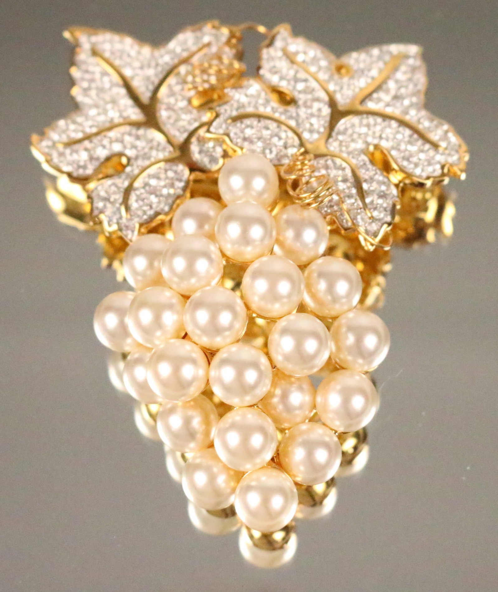 NEW Vintage Swarovski Jewelers Collection Huge Gold Plated Grapes Pearl Crystal Brooch: NEW Old stock IN THE BOX. Swarovski Jewelers Collection HUGE pearls as grapes and over 200 clear crystals with brilliant gold plating. Swan Logo. Measures 3" x 2.5" USED this is selling for $200-$300!