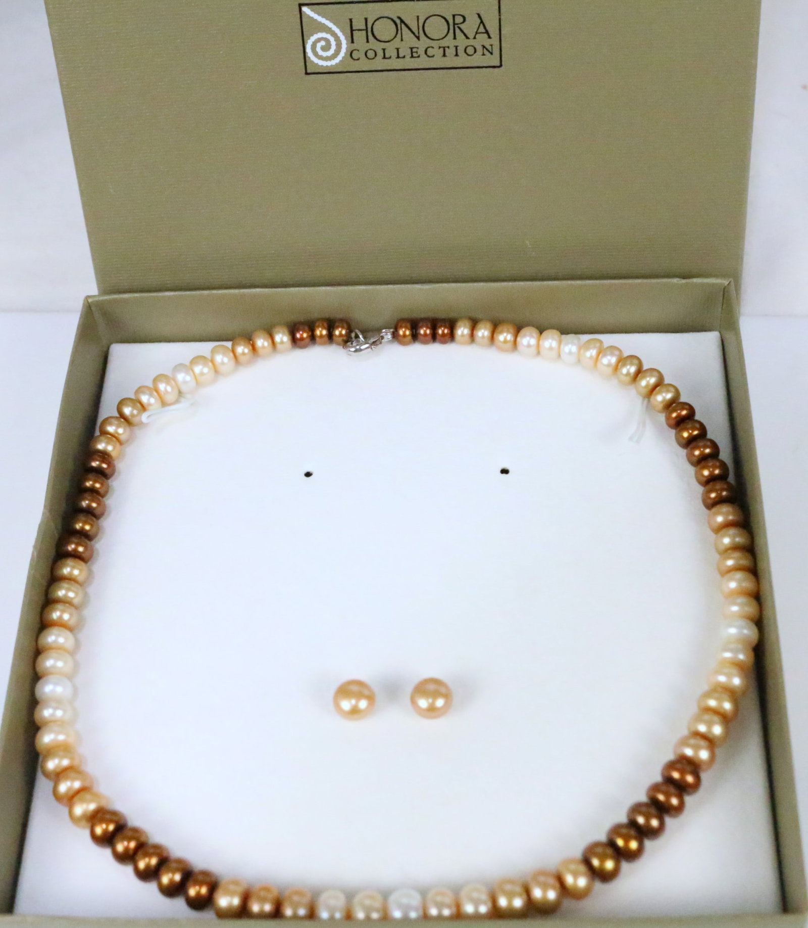 NEW Honora Freshwater Cultured Pearl Sterling Silver Ivory to brown tones shades necklace & earrings: Beautiful New in the Honora Box Rondesses in white, ivory, blush to copper in graduated sizes with a sterling lobster clasp and matching pierced earrings. Necklace is 18" long. Pearls measure from 6.5