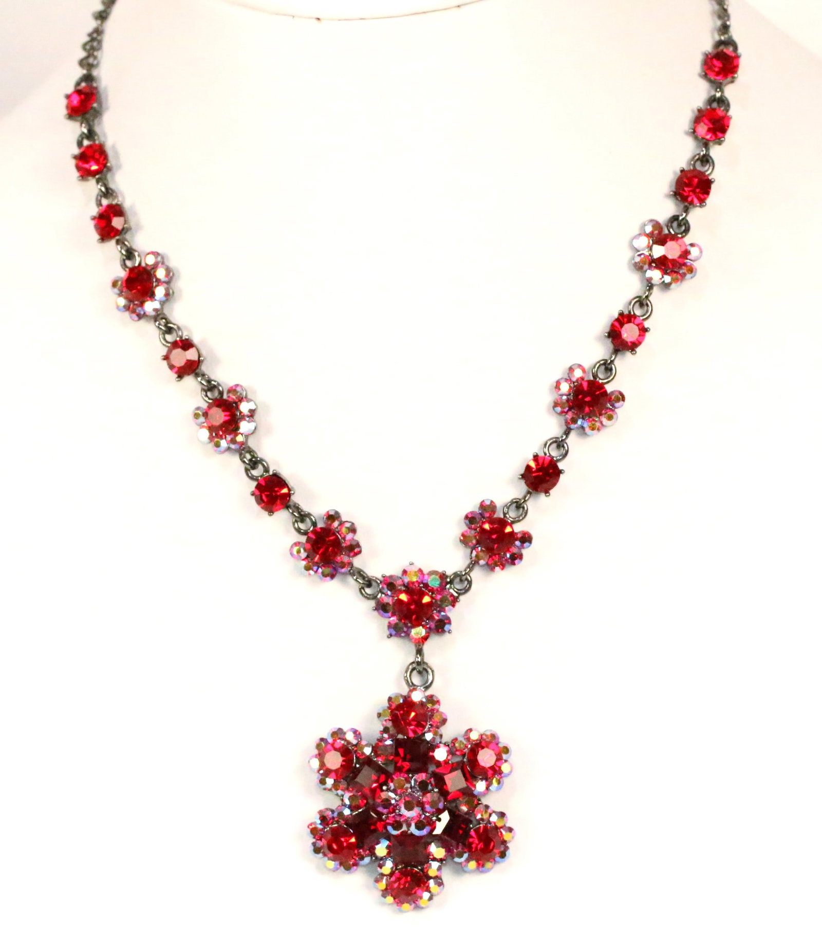 Kirks Folly Red Romantic crystal and red AB Floral statement Necklace.: Rhodium finish with Gold enamel backs. Brilliant red sparkly faceted stones surrounded by red ab. So very pretty!. Necklace measures; 19.5" long but can be worn at any length with the chain. Large cen