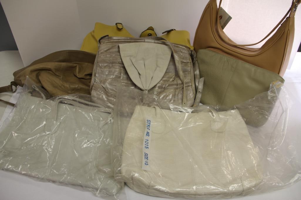 Lot of 7 ladies spring summer all season handbags, leather, eel skin, : Lot includes 1 BRAND NEW with the tax, hush Puppies tan leather organizer handbag, yellow villager by Liz Claiborne, 1 eel skin light beige handbag, Borelli Italian leather made in Korea slouch bag, a
