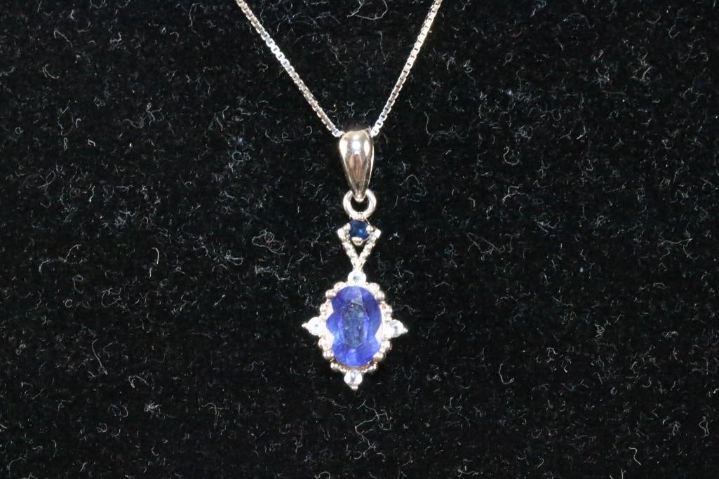 NEW sterling silver Sapphire and White Topaz Pendant necklace MATCHES LOT 19: Stamped 925. Comes in a velvet gift box. Measure: 18" long chain. Tanzanite is 7mm x 5mm.