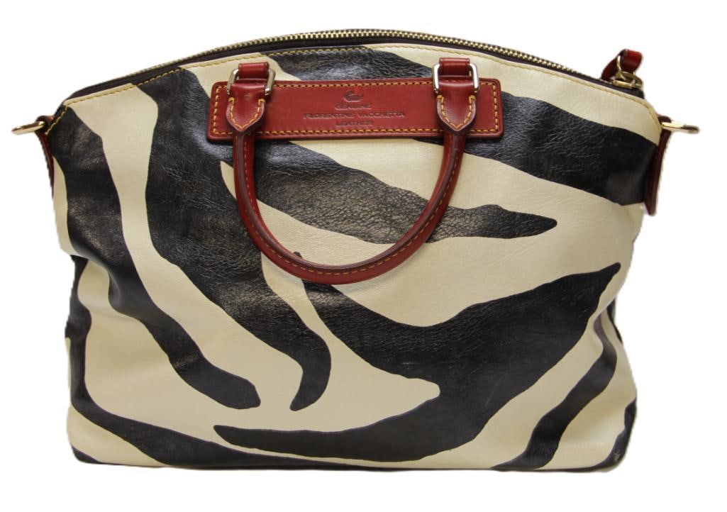Dooney & Bourke Zebra pattern Florentine Vacchetta leather Satchel handbag.: AUTHENTIC Stamped GENUINE FLORENTINE VACCHETTA LEATHER ON THE FRONT PATCH. Ivory and white leather with read contrast patch and straps. Brass colored accent. Zip closure. Read fabric lining. No should