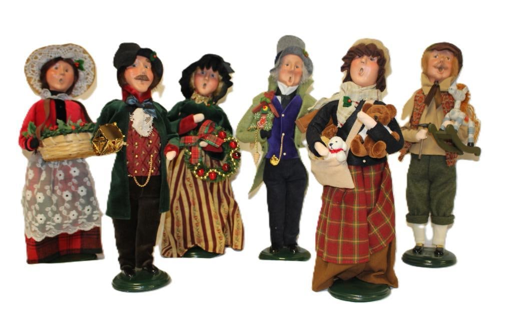 7 Piece The Caroler Figurines by Byer's Choice Ltd. and: All in size about 13" tall and a 6" high polar bear figurine with wreath around neck